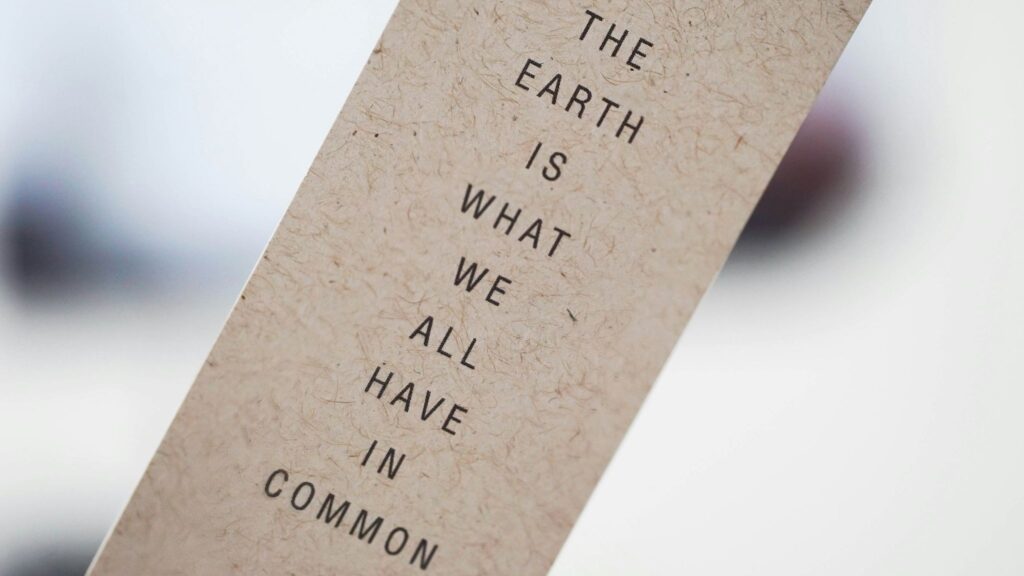 The picture of a bookmark that says: the earth is what we all have in common.